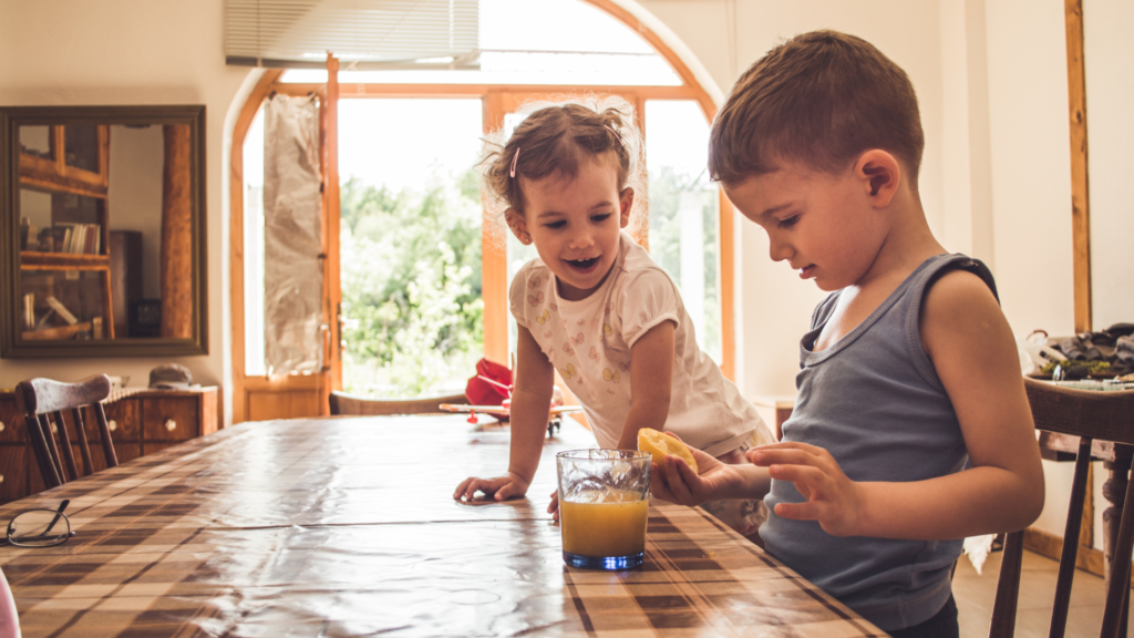 boy-making-orange-juice